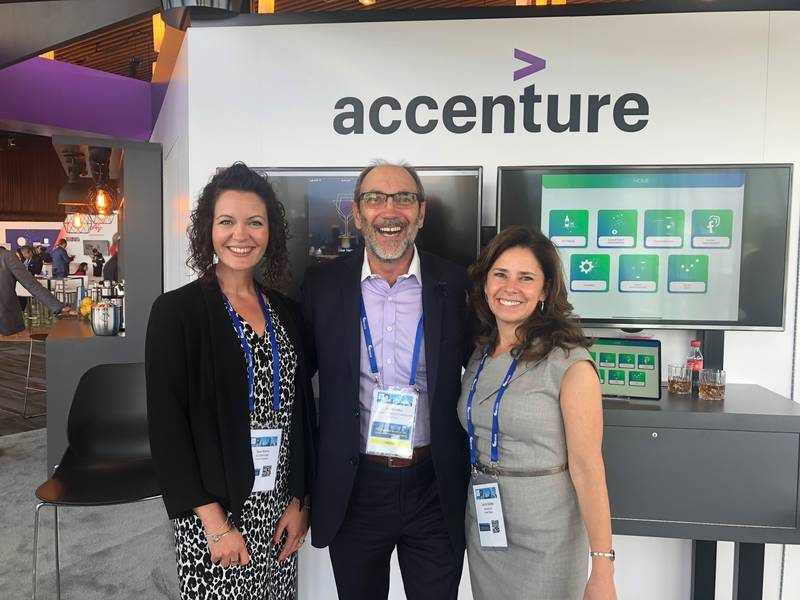 Accenture team Tara Burns and Laura Gurski with Grocery Business' Jim Slomka