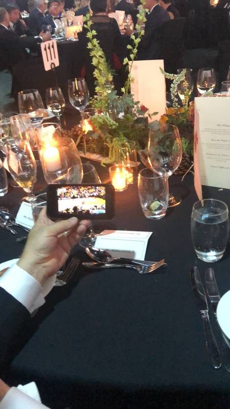 During the Black Tie dinner, Danone's Dan Magliocco's cell phone helped the people at his table watch the last few minutes of the historic win by the Toronto Raptors