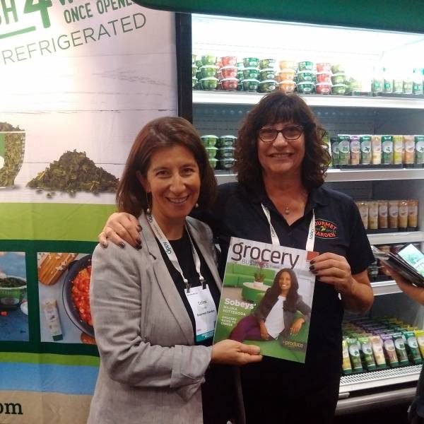 celine_endler_and_colleen_douglas_at_the_gourmet_garden_booth-7219860