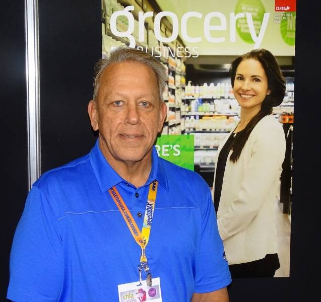 scott_ryan_of_natural_specialty_sales_in_the_grocery_business_booth-2397032